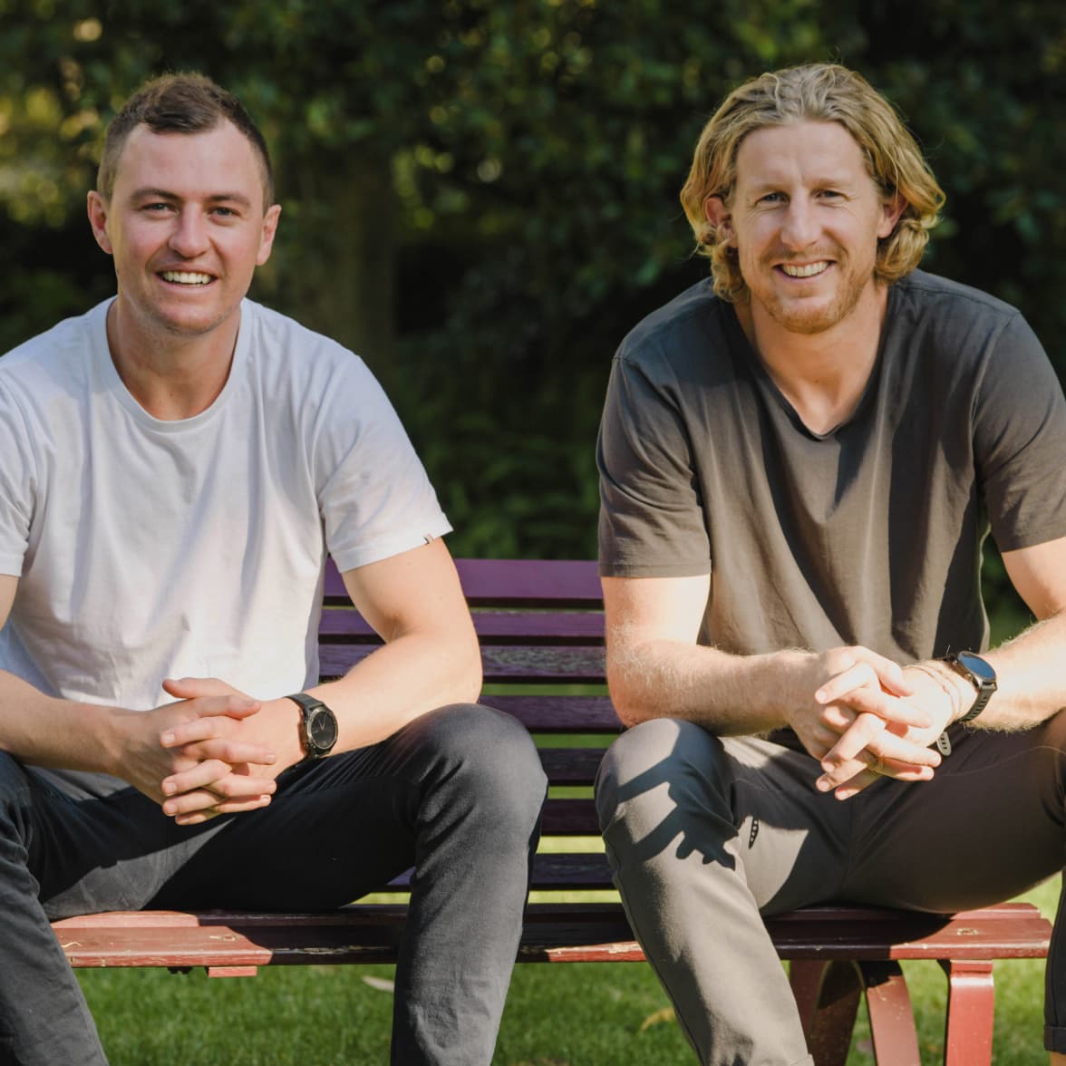 George and Ed sitting on a bench